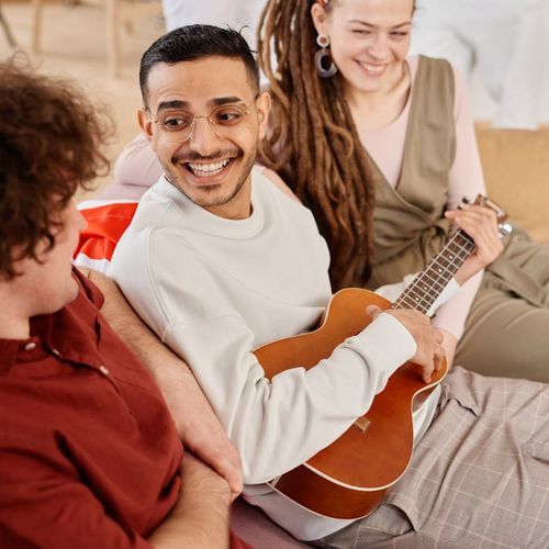 Group of diverse people smiling and relaxing during a session
